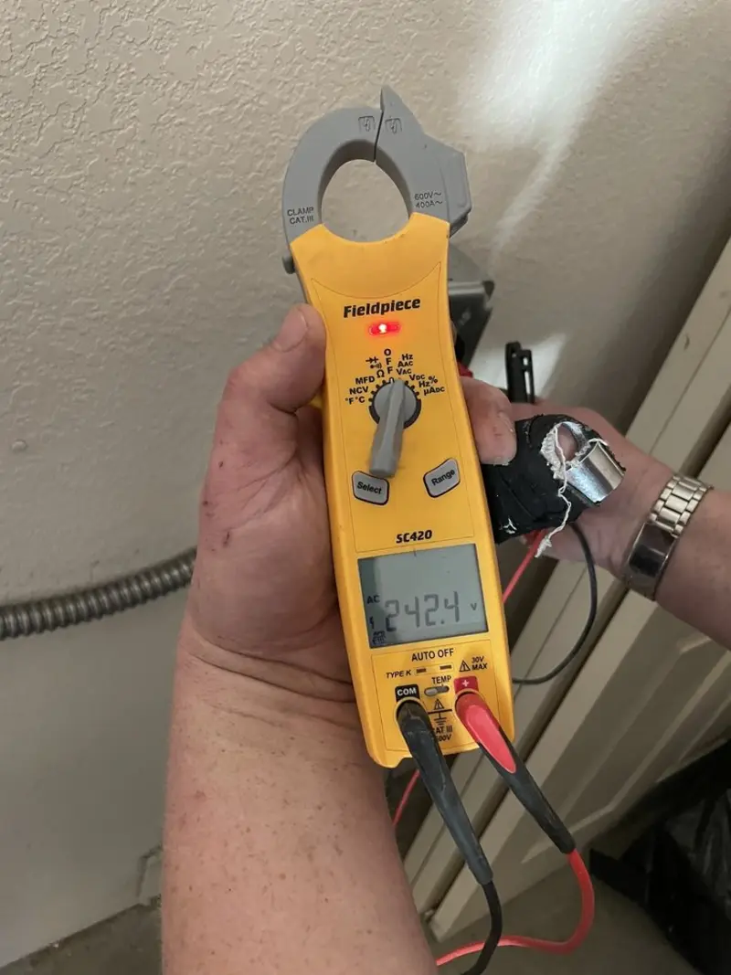 Voltage testing with clamp meter during Generator Installation in Anaheim
